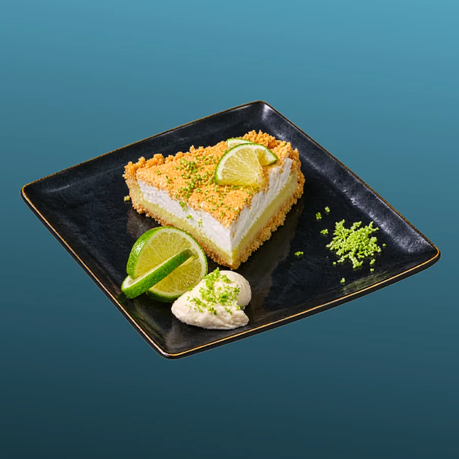 Pâtisserie / Dessert du Jour — La tarte au citron vert du jour, crumble de biscuit et crème fouettée. · Sphère Restaurant by Léa, Kouba, Alger