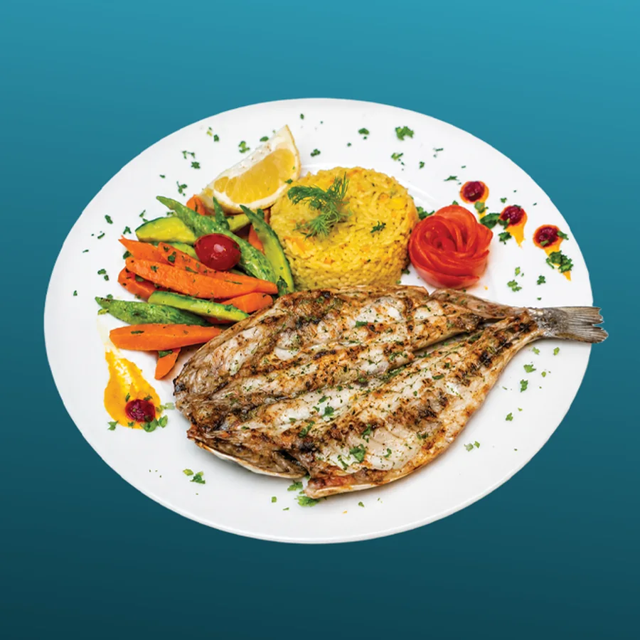 Bar / Loup de Mer (élevage) — Loup de mer entier, chair blanche et ferme qui tient bien à la braise. · Sphère Restaurant by Léa, Kouba, Alger